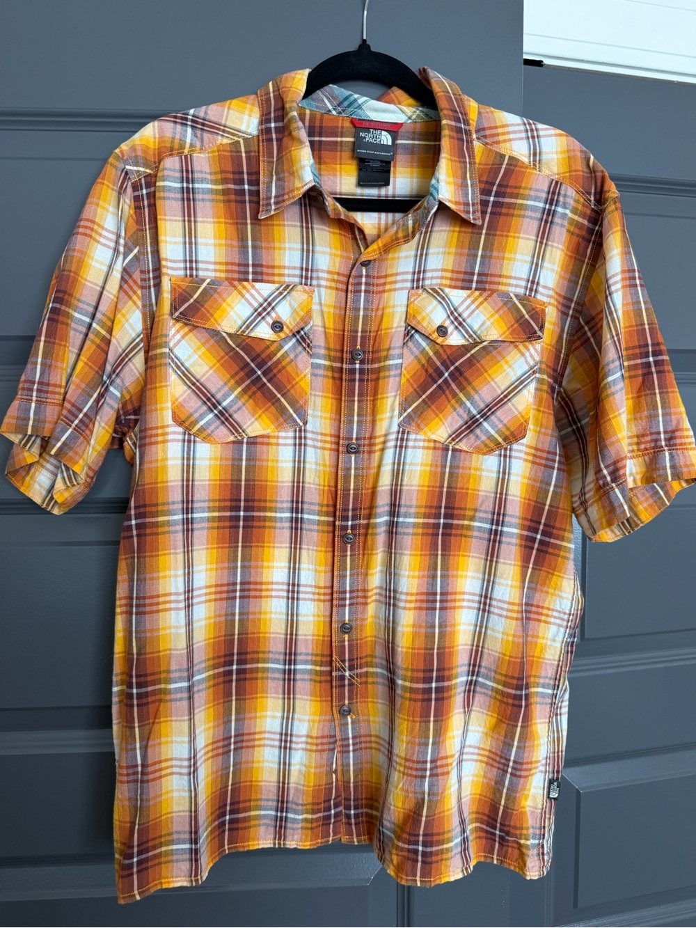 The North Face Men’s Yellow & Orange Plaid Short Sleeve Button-Down Shirt